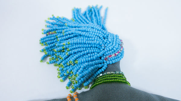 Beaded Doll with Blue Beads