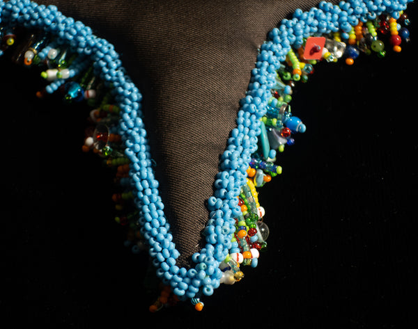 Beaded Doll with Turquoise Colored Glass Beads