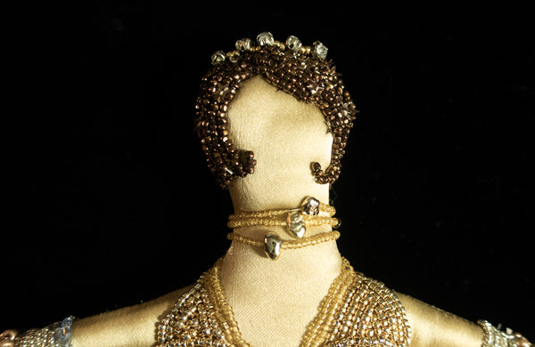 Beaded Doll with Gold Colored Beads